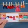 Intelligens leksaker montessori hängande kläder byte