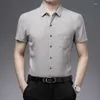 Chemises habillées pour hommes Été en hommes Vêtements à manches courtes imprimé solide décontracté lâche col rabattu bouton mode mince vintage hauts chemise