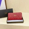 Negozio 2024 delle nuove donne della clip della borsa del diamante vendita al dettaglio all'ingrosso della chiusura lampo della mano che tiene alta bellezza netto rosso Lady Card Bag Portafoglio Multi Anti Smagnetizzazione capelli