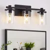 Lámparas de baño de 5 luces con pantalla de vidrio transparente, E2640W, lámparas de tocador de baño negras mate, apliques de pared de baño sobre espejo para dormitorio