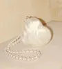 Acrylic heart bag women designer evening party cute pearl color purse clutch handbag with strap wholesale 240402