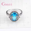 Anillos de racimo Joyería de compromiso romántica Venta de anillo de plata esterlina 925 para mujeres Luz Azul Claro Zircon Redondo al por mayor