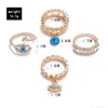 Avec des pierres latérales 4pcs / set nouvelle mode turquoise diamant bagues femmes filles 18k Glod mauvais œil bague ensemble de bijoux livraison directe Dhzx4