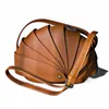 European / American Fi First First Caler Cowhide Fold Shell Type Snail Crossbody Bag Persalité Fi Hands pour femmes K67O #