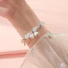 Charm Bracelets Sweet SpringSummer Korea Pearl Bell Orchid Hand String Female Simple Literary Pink Gradual Beaded Bracelet Wholesale