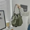Nowe nylowe torby kubełkowe w stylu koreańsko -sznurka miękka torba crossbody duża pojemność swobodna torba na ramię