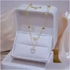 Pendentif Colliers Femmes Clavicule Chaîne Charme Élégant Collier De Mariage Couleur Or Double Couche Coeur Brillant Bling Aaa Zircon Bijoux D Dhcj9