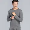 Męska bielizna termiczna 2PCS Winter Warme Men Zestawy bawełniane długie Johns Tops