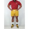 Les shorts de créateurs se vendent bien.Nouveau Pantalon pour hommes été recadrée élastique tissé