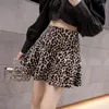 Kjolar hög midja lösa tryck leopard mode vintage casual sexig temperament kvinnokläder faldas mujer mini veckad