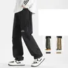 Herrbyxor Spring Autumn Zipper Letter Tryckt Elastisk hög midjeficka Fast Polted Casual Sportswear Trousers Fashion