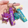 أزياء الرسوم المتحركة فيلم Keychain Character Rubber و Key Ring لسلسلة مفاتيح المجوهرات على ظهره 083550