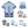 Пуговица рубашка мужская рубашка дизайнер-рубашка набор Chemise Luxe Luxe Fashion Blue Coconut Tree Phayer Hawaiian Рубашка Пара рубашка с двумя частями дизайнер рубашки M-3XL YYG