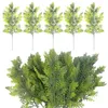 Flores decorativas 1/10 piezas Navidad artificial pino aguja ramas de árbol simulación plantas verdes DIY corona hojas falsas año fiesta decoración