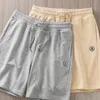 Pantalones de hombre Ropa de playa informal de moda Pantalones cortos con cordón de cinco puntos que se mantienen frescos y cómodos en climas cálidos