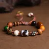 Charm Armband Tibetan Tiger Teeth Dzi Bead Multi-Treasure Armband Dopamine Women's Justerable String Niche All-Strap Retro Accessori