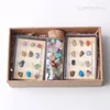 Figurines décoratives, boîte en cristal de spécimen de pierres précieuses polies naturelles et ensemble de bouteilles en verre de gravier