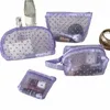 2023 Nuevo patrón de corazones de malla Bolsa de maquillaje Mini bolsa de cosméticos Kits de artículos de tocador transparentes Bolsa de almacenamiento de lápiz labial de viaje portátil x3df #