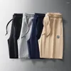 Pantalones de hombre Ropa de playa informal de moda Pantalones cortos con cordón de cinco puntos que se mantienen frescos y cómodos en climas cálidos