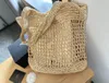 Sac de designer tendance 2024 Français évidé une épaule sac tissé d'herbe avec grande capacité fourre-tout sac à bandoulière pour femme