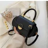 Umhängetaschen 2024 Strukturierte Umhängetasche Rundes Schloss Kleine Handtaschen Top Griff Totes Mode Oval Messenger Geldbörsen Mujer