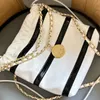 Classico woc mini designer woC Mini designer Crossbody Borse Tote Fashion di alta qualità Guida spalla in pelle Luxury Diamond Modello trapuntato Doppia lettera Black White Borse