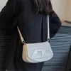 9A Designer Handtaswinkels zien prijzen exploderen Crowdsourced Dign Dingdang Bag Lente/zomer Handheld onderarm dames pittige meisjesstijl enkele schouder