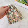 14*16cm doek bloemen reizen cosmetische lippenstift munten tas opslagtas schattige make -up handtassen dames portemonnee organisator trekkoord tas t5h4#