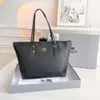 Coachshoulder Bag Luxury Designer Coache Couch Handväskor Ny tygväska stor kapacitet mjuk läder bärbar allt-i-ett-pendlare kvinna väska