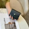Portefeuilles 2024 nouveau cuir de vachette imprimé paume style court trois fois véritable portefeuille correspondant en cuir clip couleur bloquant le sac de carte