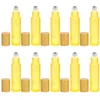 Garrafas de armazenamento 10 pcs vidro amarelo rollerball garrafa dispensador para óleos aço olho creme aplicador recarregável