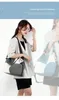 ショルダーバッグデザインファッション大規模ハンドバッグ女性トレムキャンバスバッグのトレンド多機能のためのキャンバスバッグ