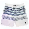 Letnie nowe anty -pluskanie czterostronne sprężyste spodenki Spodnie Szybkie suszenie spodnie plażowe dla mężczyzn