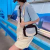 Drawstring japansk söt mini messenger väska kvinnlig sommar personlighet ljus liten fyrkantig axel duk