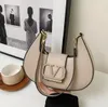 2024 Handväska Ladies Luxury Bags Designer Mini Bag Leisure Travel Ribbon Tote Bag Läder Material Fashion Shoulder Bag Wallet Axillary Pouch A19