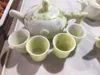 Set di articoli per il tè Teaset di giada del drago giallo naturale Salute Gongfu 1 teiera 4 tazze da tè Cerimonia del tè cinese Jade Stone Teaset