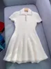 Vestidos de fiesta Momento de latido del corazón 2024 Primavera Marfil Blanco Alta calidad con cuentas de felpa de punto de punto de manga corta falda