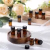 Bouteilles de stockage 5 pièces 1 ml 2 ml 3 ml 5 ml échantillon de parfum liquide bouteille en verre ambré avec réducteur d'orifice et bouchon petits flacons transparents d'huile essentielle