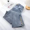 Kvinnors jeans Split vårklänning 2024 Hög midja Ljus färgflare byxor beskurna