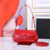 Borsa sottobraccio in pelle verniciata di alta qualità 1BD345 borsa a tracolla borsa di design grande borsa a triangolo rosso borsa a tracolla con borsa a mano in pelle di lusso dal design curvo