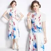 Tweedelige jurk Vintage elegante geplooide 2-delige set zomer bloemen bedrukt maïs korte mouw top elastische taille rok casual feestrok pak voor dames 2024