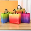 Förvaringspåsar Stobag 50st grossistfärg Non-Woven Tote Shopping Portable Fabric Presentförpackning Återanvändbar påse Anpassad logotyp (extra avgift)