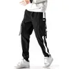 Mäns byxor pants porslin mode last män sömmar rep korsett ins löst hip-hop casual