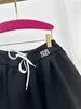 2024年の女性のスカートラグジュアリーデザイナーの女性の女性のソリッドスカート夏のレディカジュアルハイウエストミニスカートファッション
