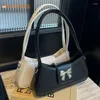 Axelväskor båge dekor väska fransk chic hobo pu solid crossbody kvinnor hög kvalitet små handväskor nyhet damer armhålväska