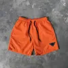 Homem designer homens shorts calças de praia shorts verão nadar curto na altura do joelho hip hop high street treinamento esportivo calças de praia homens mulheres algodão casal cintura elástica