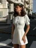 Sukienki imprezowe eleganckie kołnierz z mini sukienki 2024 wiosna lato szykownie solidny krótki rękaw seksowny szczupły guziki kobiety dojeżdżające do pracy