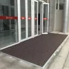 Tapis d'entrée de porte intégré imperméable à l'eau, tapis d'extérieur en aluminium commercial pour le contrôle de la poussière du magasin