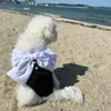 Dog Apparel Lycra Bowknot Pet Swimsuit Cute Black Elastic Vest Quick-Drying Romper Pool