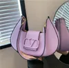 2024 Handväska Ladies Luxury Bags Designer Mini Bag Leisure Travel Ribbon Tote Bag Läder Material Fashion Shoulder Bag Wallet Axillary Pouch A19